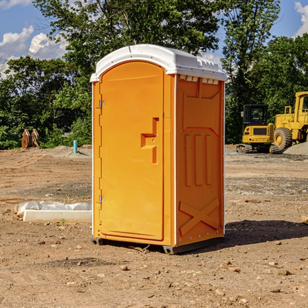 what is the cost difference between standard and deluxe portable restroom rentals in Redwood County